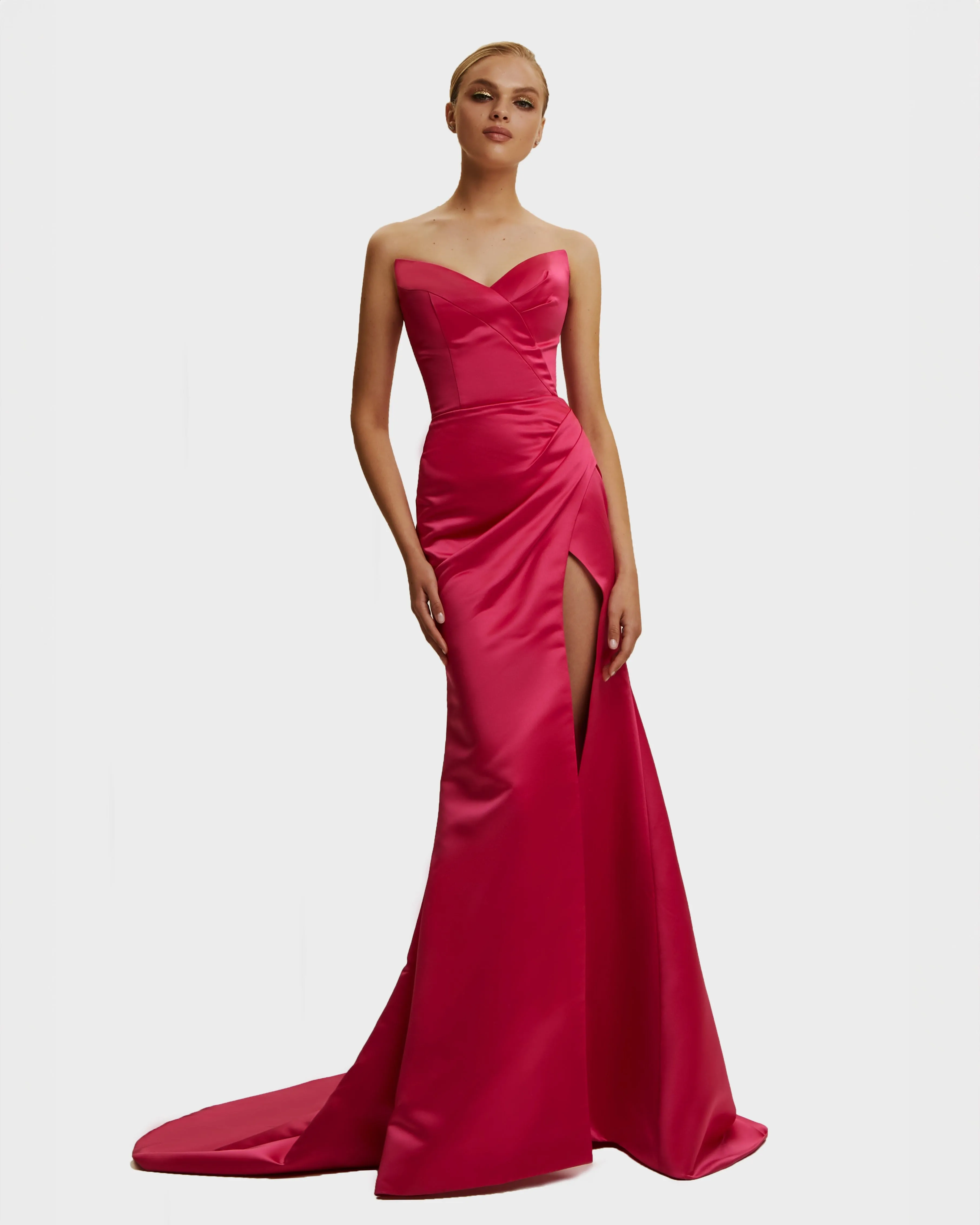 Fuchsia Strapless evening gown with thigh slit